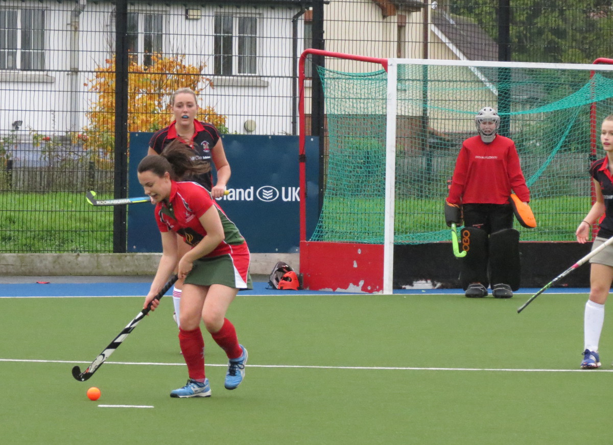 DLHC 1XI midfielder Helen Hooks drives forward