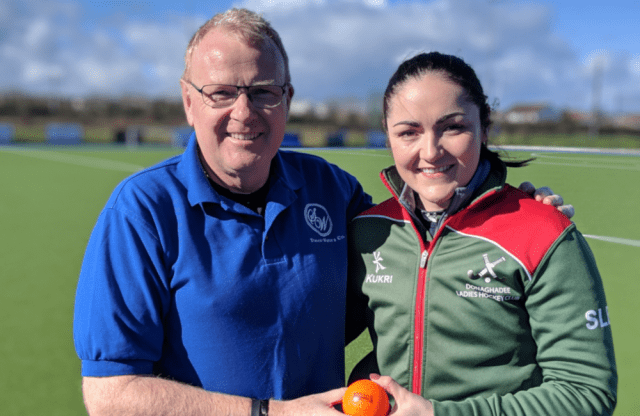 William McAdam of Stanley Woods Accountants presents the match ball to Sarah-Louise Baird